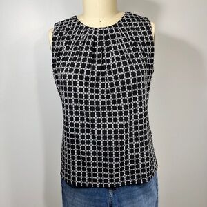 Calvin Klein sleeveless blouse. Black/white. Size L